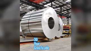 แผ่นผนังม่านอะลูมิเนียมสีเทาอายุ 30 ปี